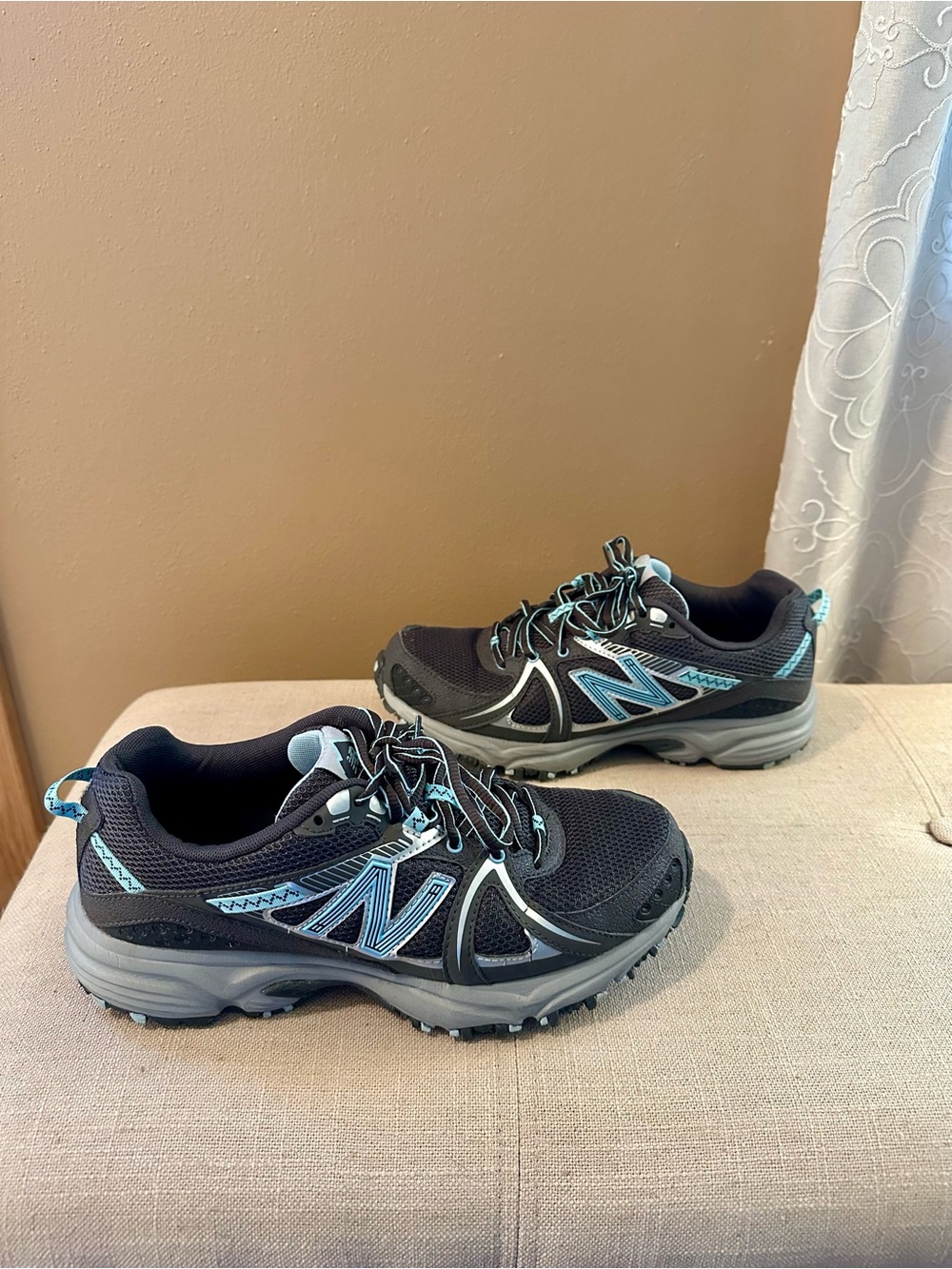 New Balance Women’s Black and Light Blue Trail Sneakers
